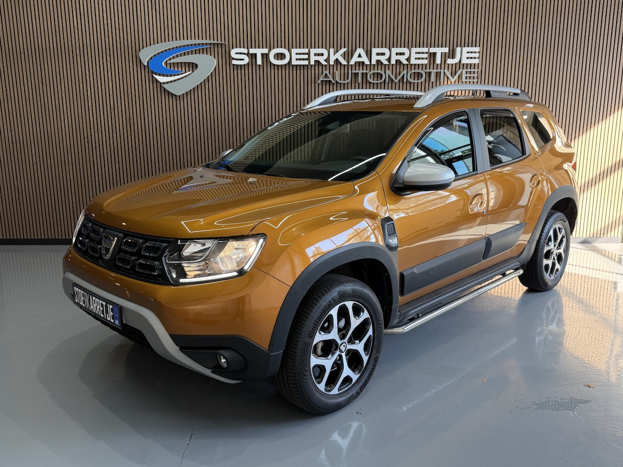 Dacia Duster - 1.2 TCe Comfort Airco | Schuifdak | Cruise control | PDC | 17" | NAP | Volledig keurig net - AutoWereld.nl