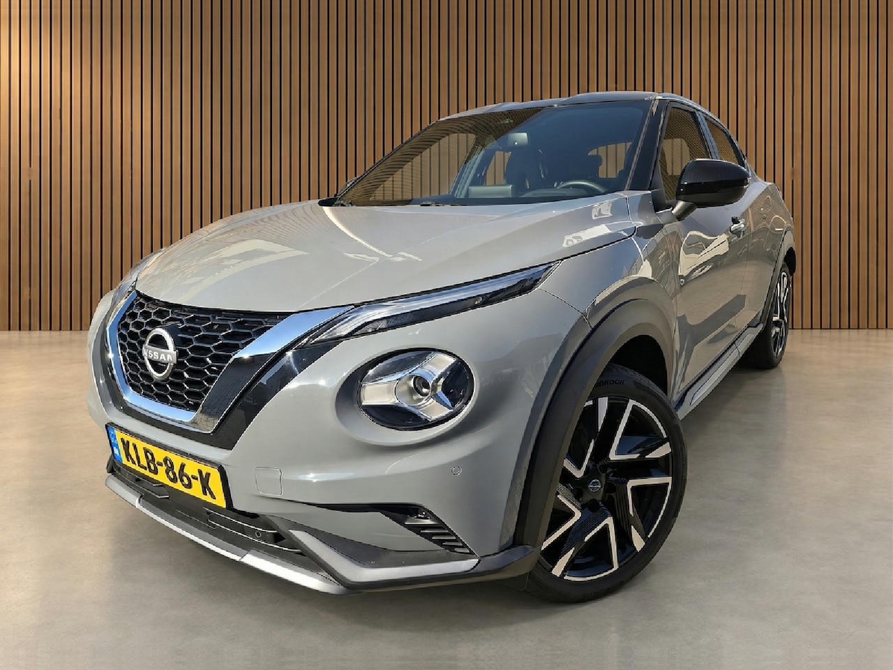 Nissan Juke - 1.0 DIG-T N-Design automaat / navigatie / camera - AutoWereld.nl