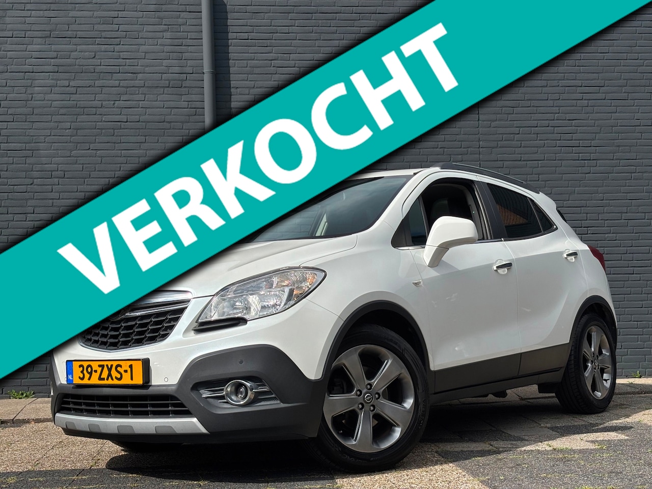 Opel Mokka - 1.6 Cosmo | Schuifdak | Camera | Stoelverwarming - AutoWereld.nl