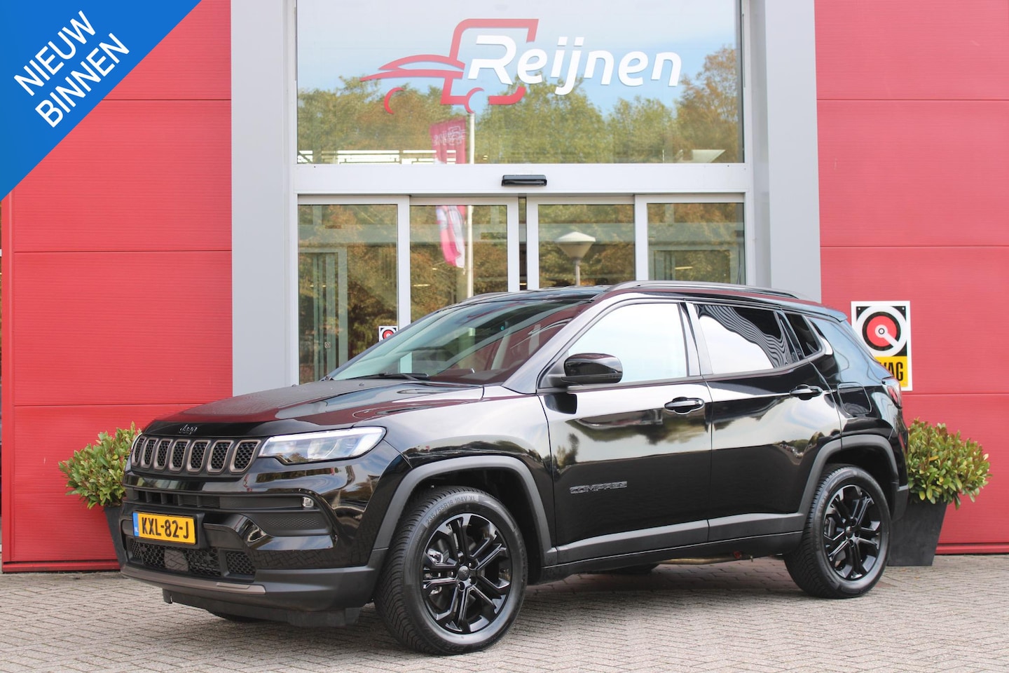 Jeep Compass - 4xe 240PK Plug-in Hybrid ELECTRIC UPLAND | LAGE KM STAND! | NAVIGATIE | DRAADLOZE APPLE CA - AutoWereld.nl