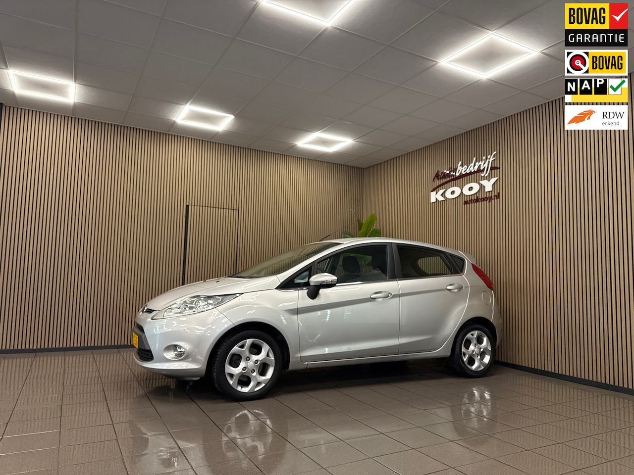 Ford Fiesta - 1.25 Titanium * 77.763 km + NAP / Airco / LM Velgen / NL Auto * - AutoWereld.nl