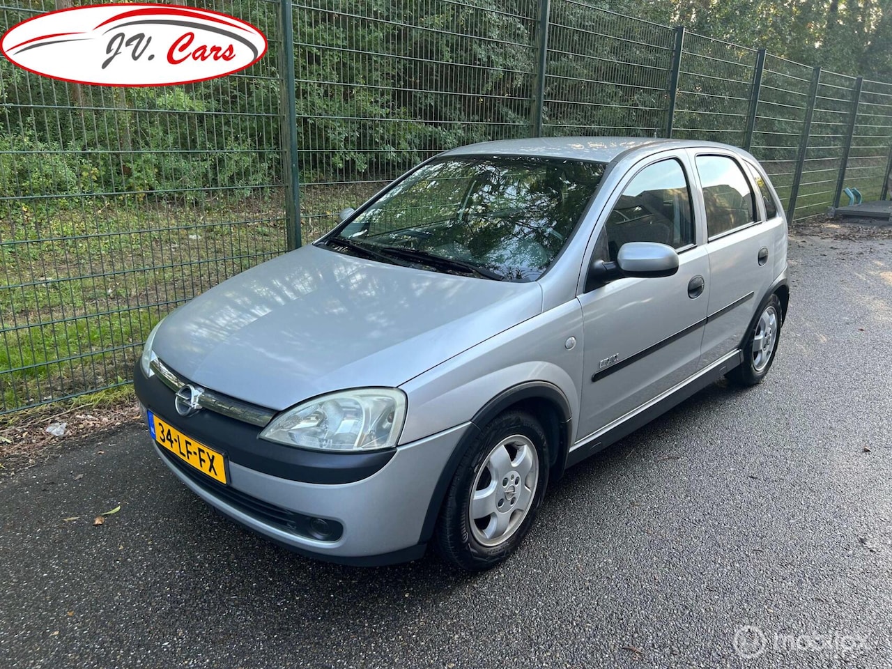 Opel Corsa - 1.2-16V Elegance airco Lage KM stand van 88158 - AutoWereld.nl
