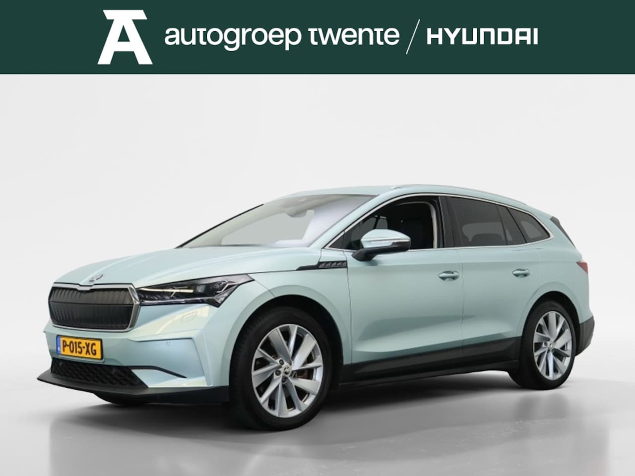 Skoda Enyaq iV - 80 First Edition | Wegklapbare Trekhaak | Stoelverwarming | Navigatie | Camera | - AutoWereld.nl