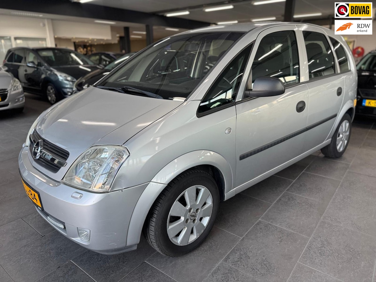 Opel Meriva - 1.8-16V Cosmo automaat airco cruise controle lm-velgen elektrische pakket parkeersensoren - AutoWereld.nl
