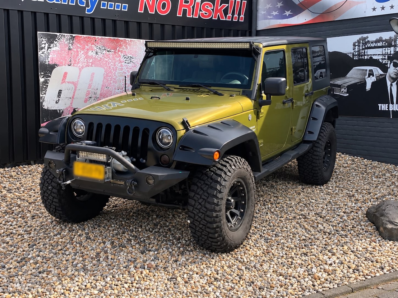 Jeep Wrangler Unlimited - 3.8 Sahara Fulldressed - AutoWereld.nl