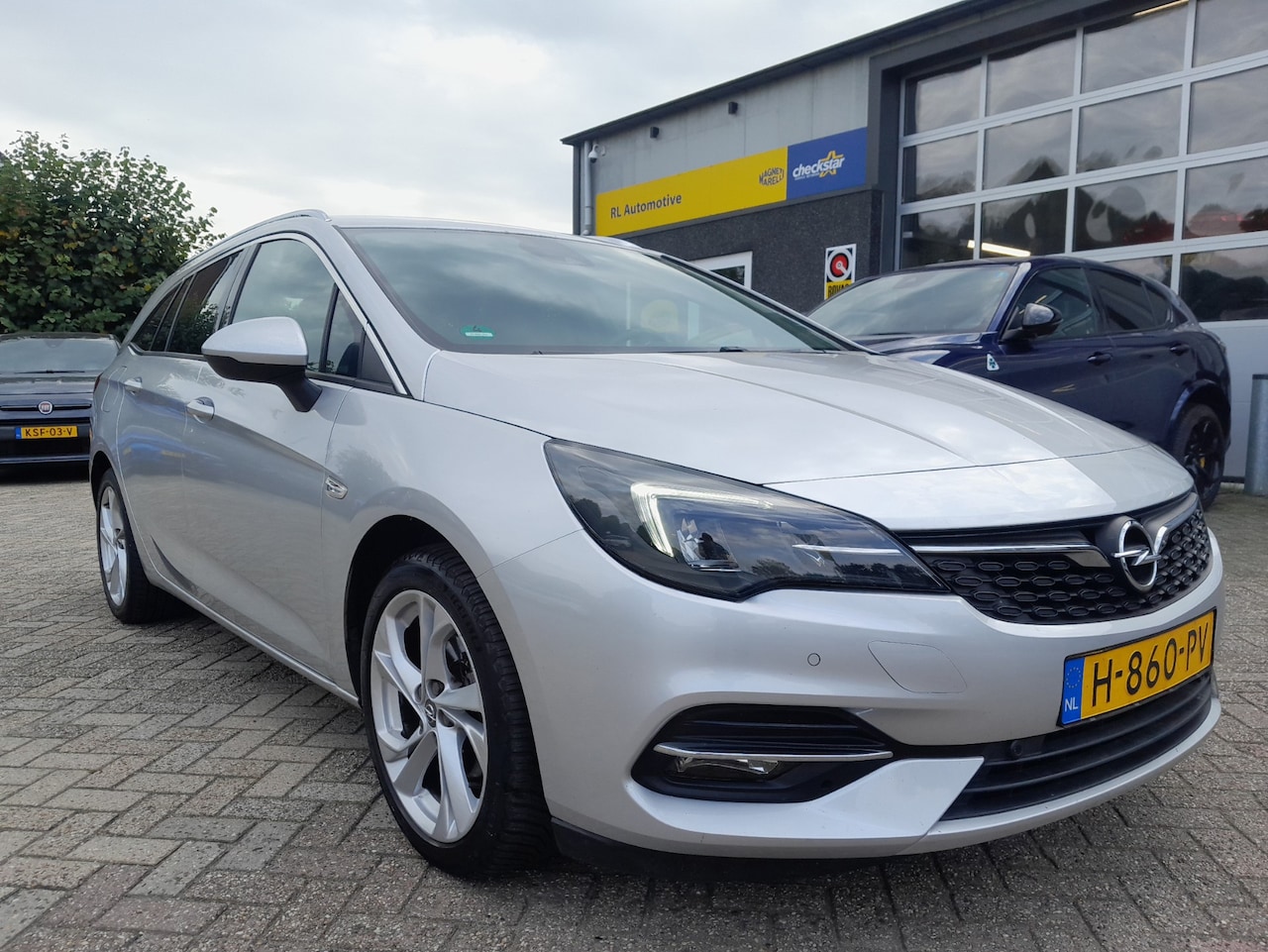 Opel Astra Sports Tourer - 1.2 Edition - Navigatie - Led - Trekhaak - AutoWereld.nl
