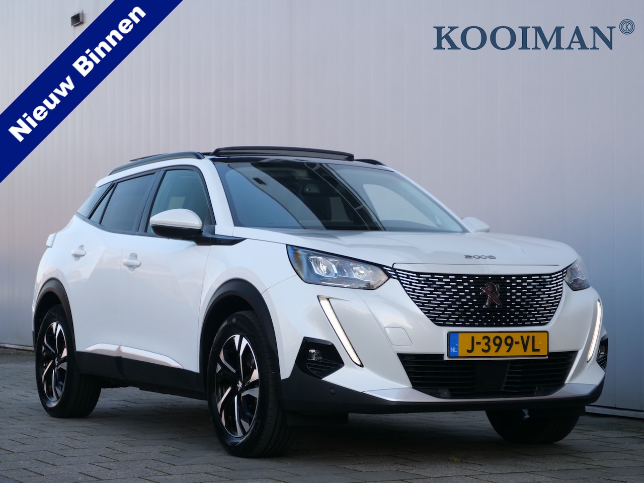 Peugeot e-2008 - EV Allure 50 kWh 136 Pk Automaat Navi / DAB / Apple Carplay / Camera / SOH 90,5 % - AutoWereld.nl