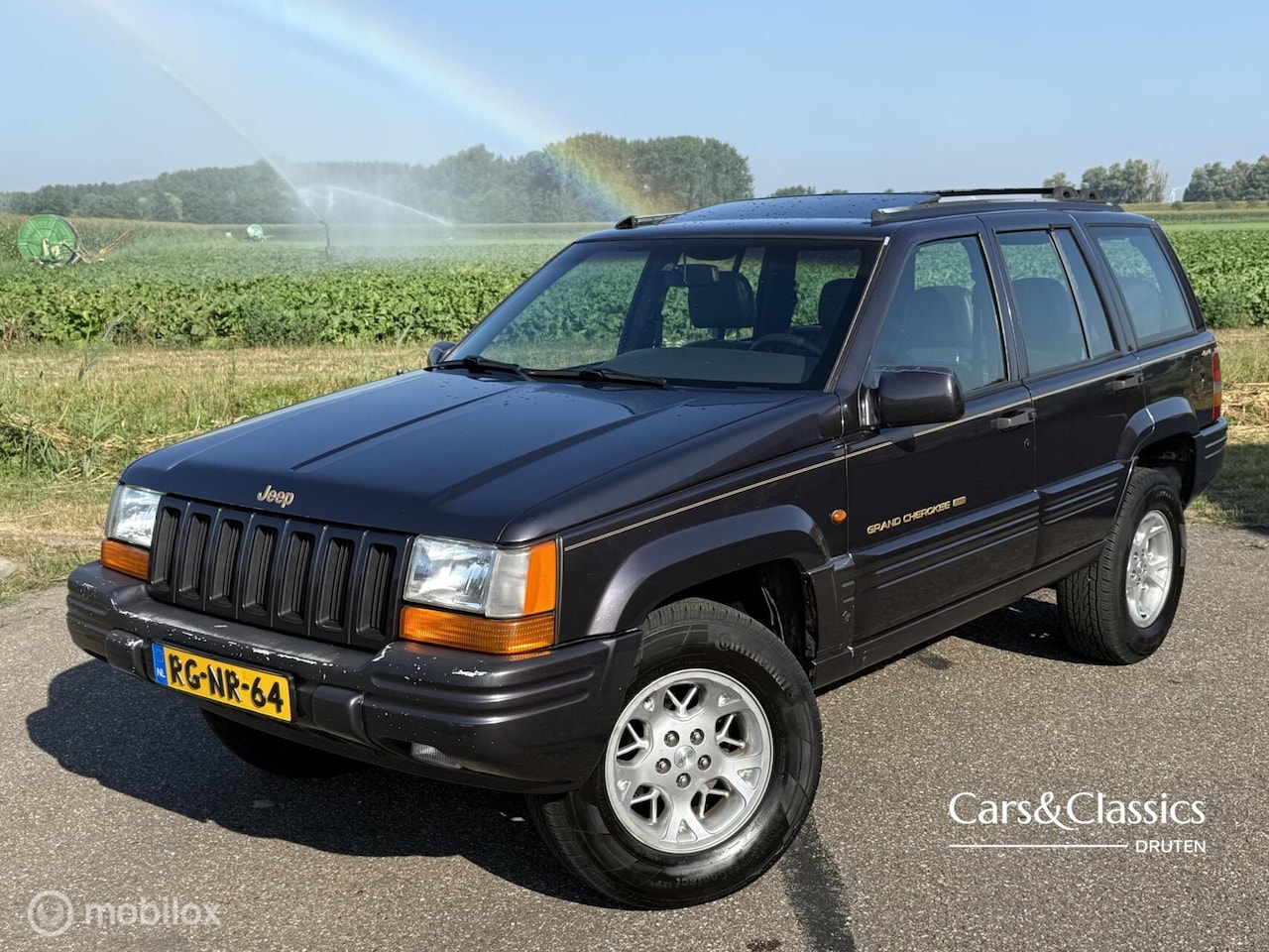 Jeep Grand Cherokee - 5.2i V8 Limited 5.2i V8 Limited, NL Auto, Airco - AutoWereld.nl