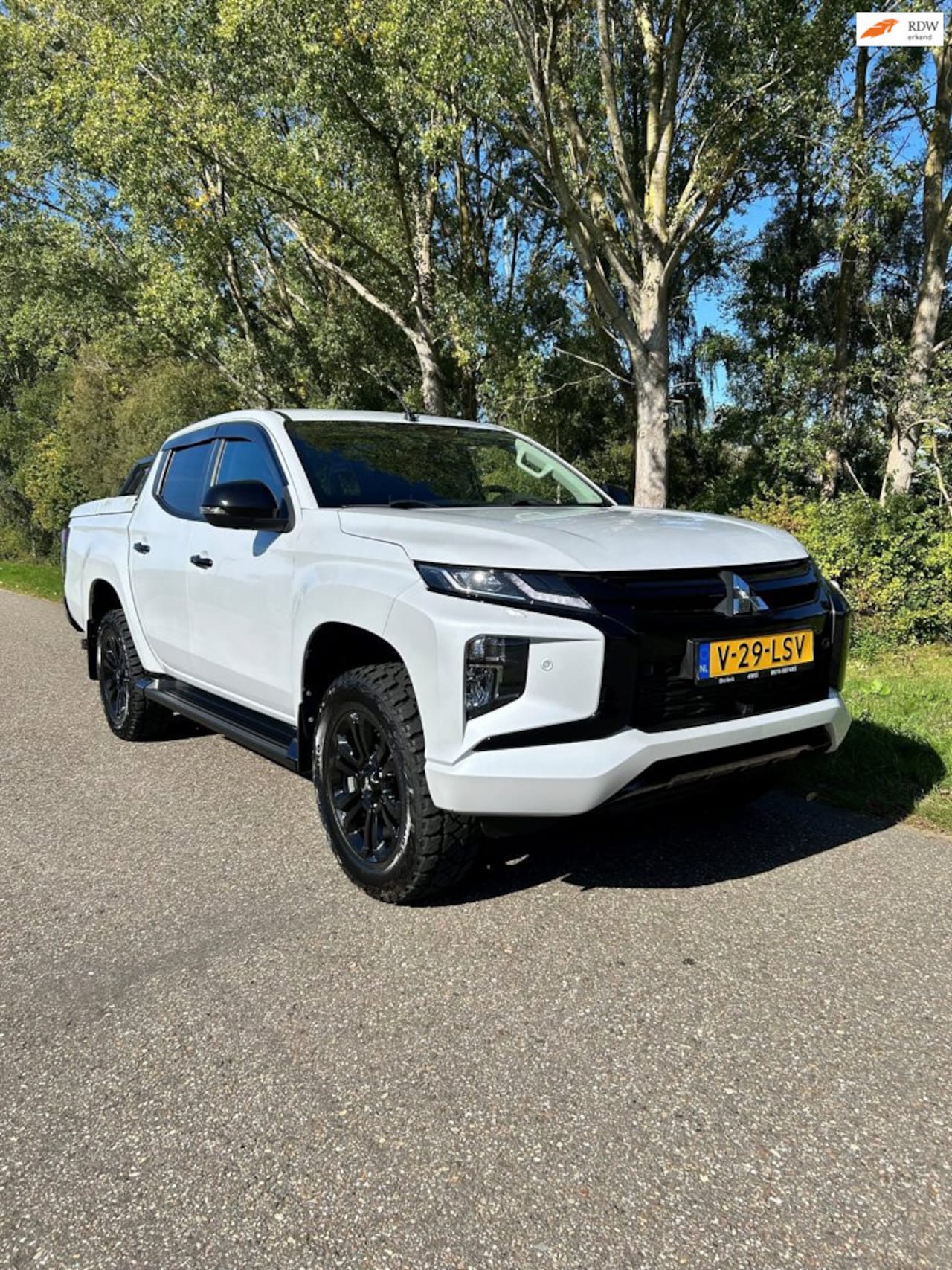 Mitsubishi L 200 - 2.2 DI-D Double Cab Instyle 2.2 DI-D Double Cab Instyle - AutoWereld.nl