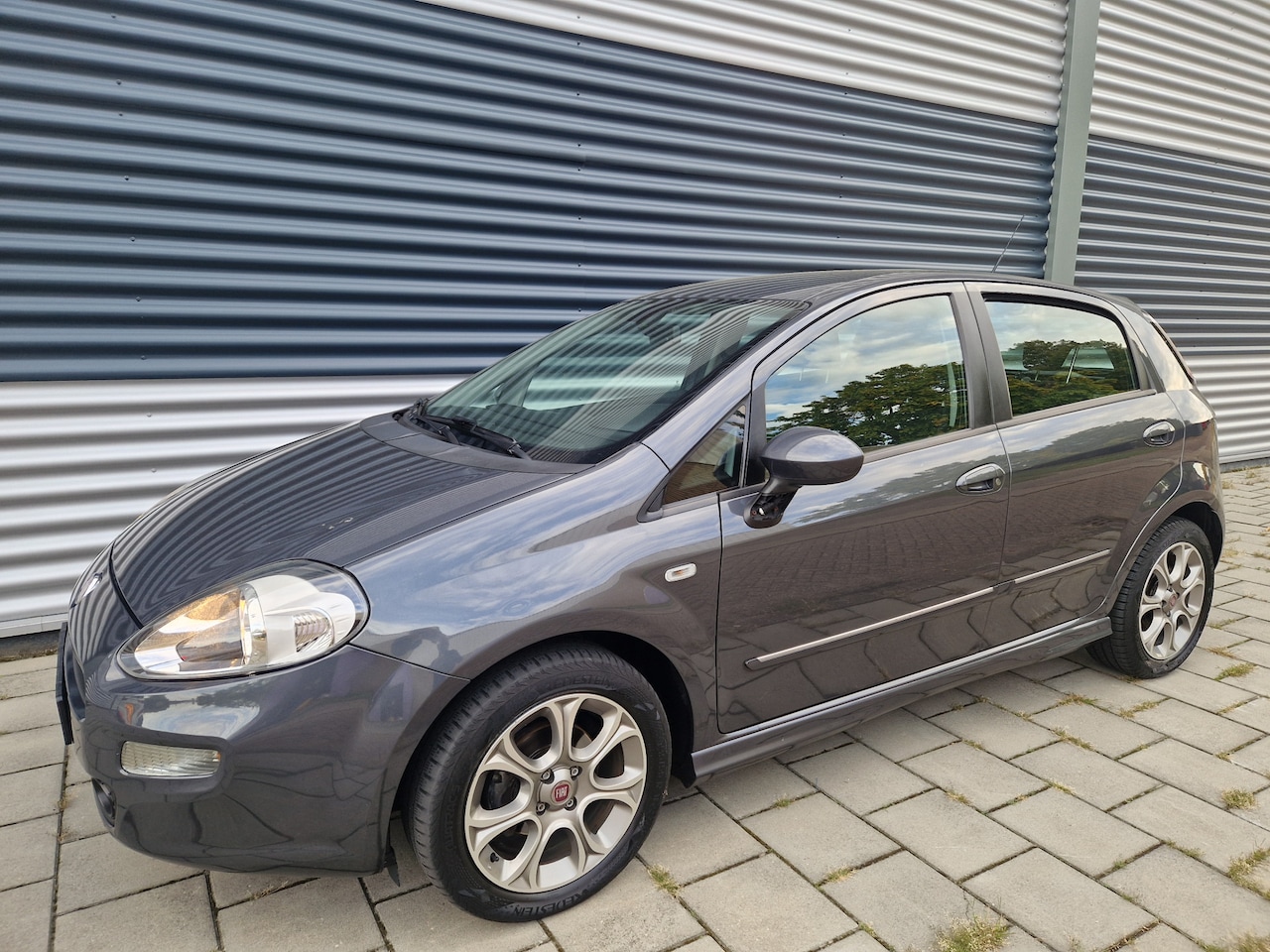 Fiat Punto Evo - 0.9 TwinAir Street Airco, NAP,PDC, - AutoWereld.nl