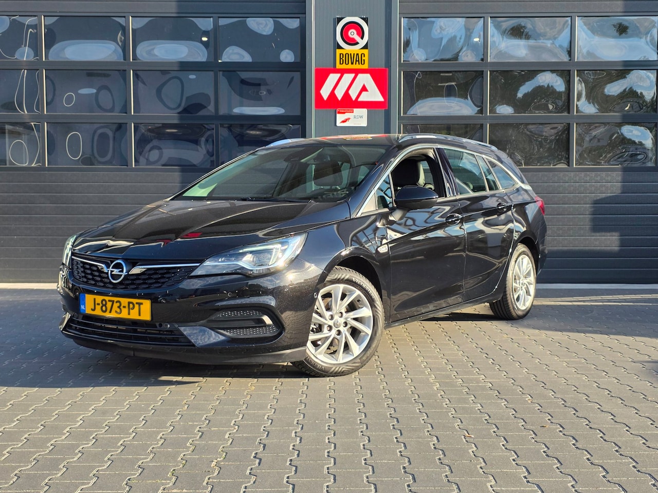Opel Astra Sports Tourer - 1.2 Elegance | TREKHAAK | NAVI | CARPLAY | CAMERA | CRUISE - AutoWereld.nl