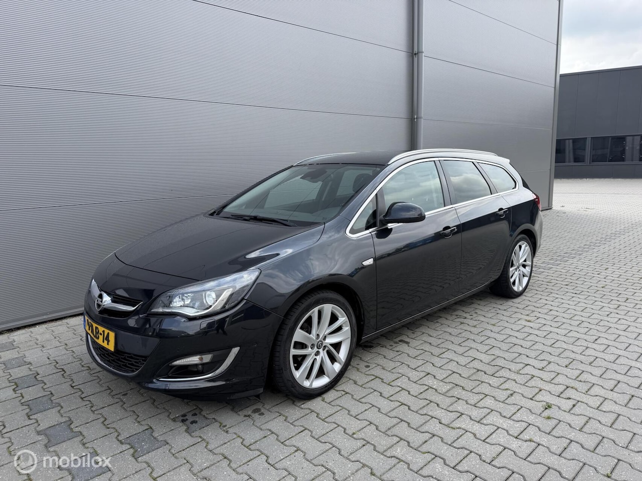 Opel Astra Sports Tourer - 1.4 Turbo Edition Xenon Leder Nap - AutoWereld.nl