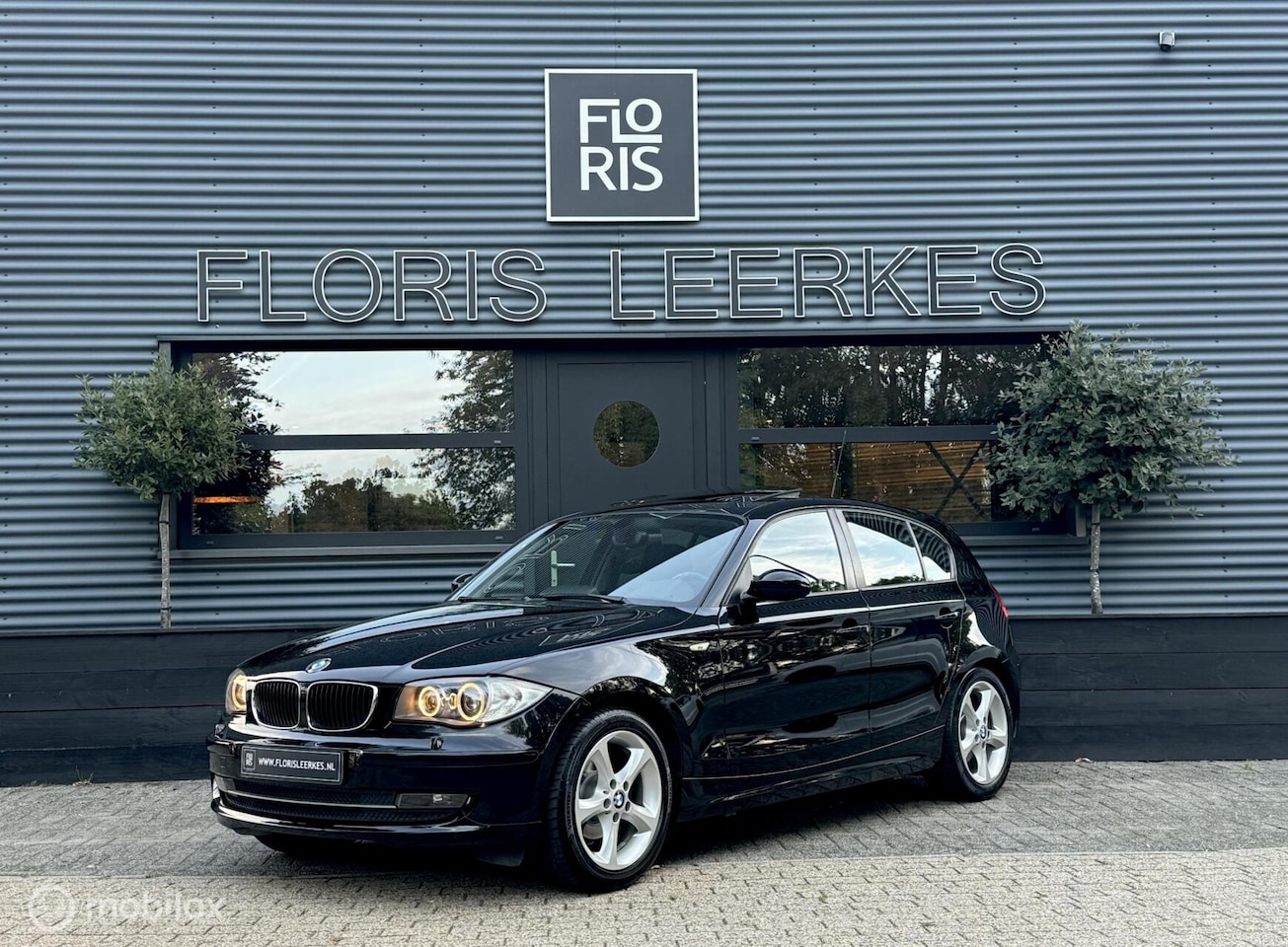 BMW 1-serie - 118i | Dakje | Xenon | Clima | Navi | 5 Deurs - AutoWereld.nl