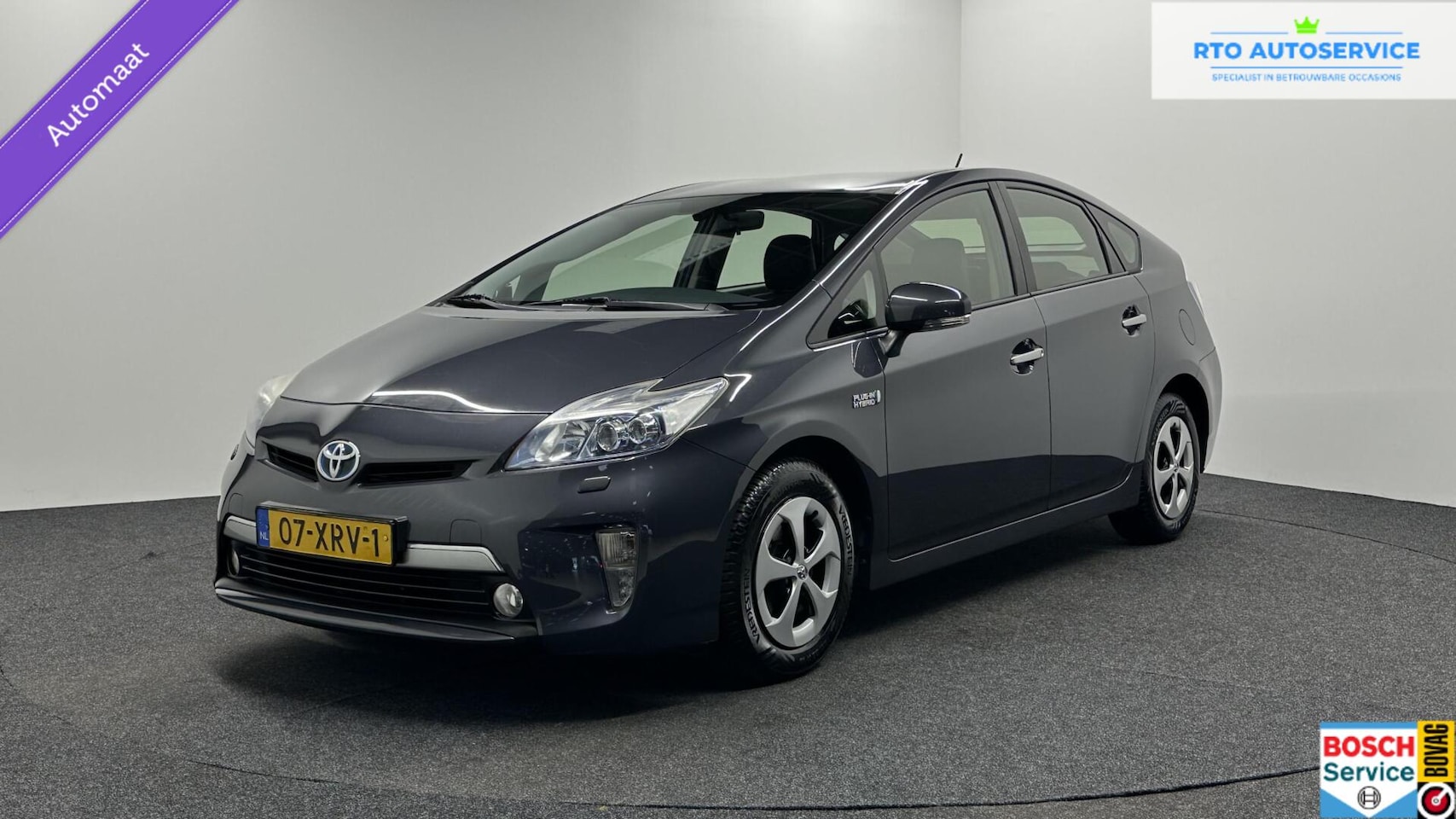 Toyota Prius - 1.8 Plug-in Dynamic Business CAMERA NAVI ECC CRUISE TREKHAAK. - AutoWereld.nl