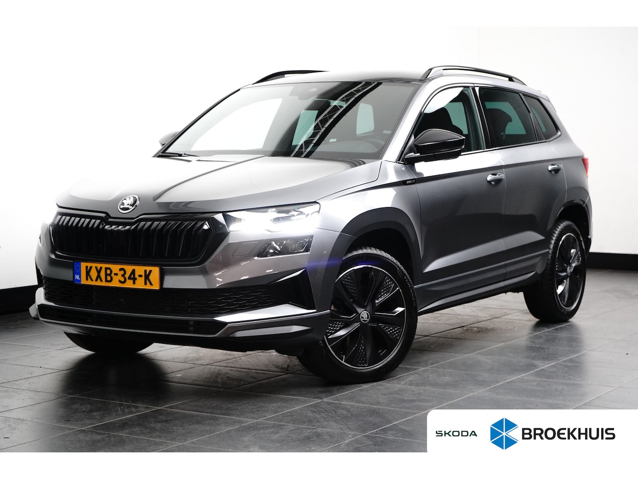Skoda Karoq - 1.5 TSI 150 pk ACT Sportline Business 7-DSG | Achteruitrijcamera | Cruise control | Stoel/ - AutoWereld.nl
