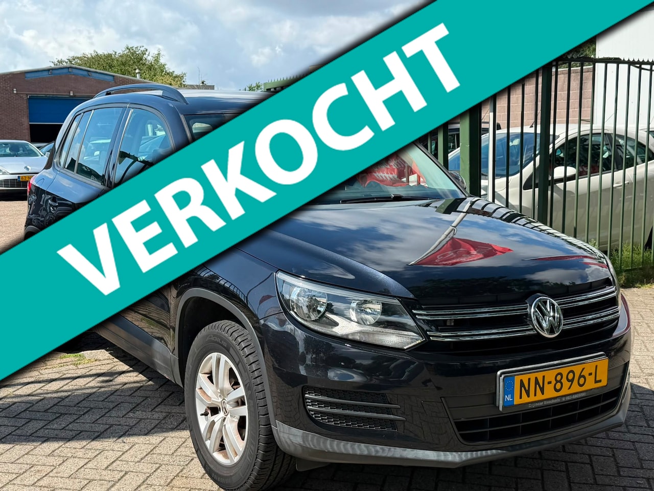 Volkswagen Tiguan - 1.4 TSI Sport&Style 1e eigenaar volledig dealer onderhouden trekhaak airco elektrische ram - AutoWereld.nl