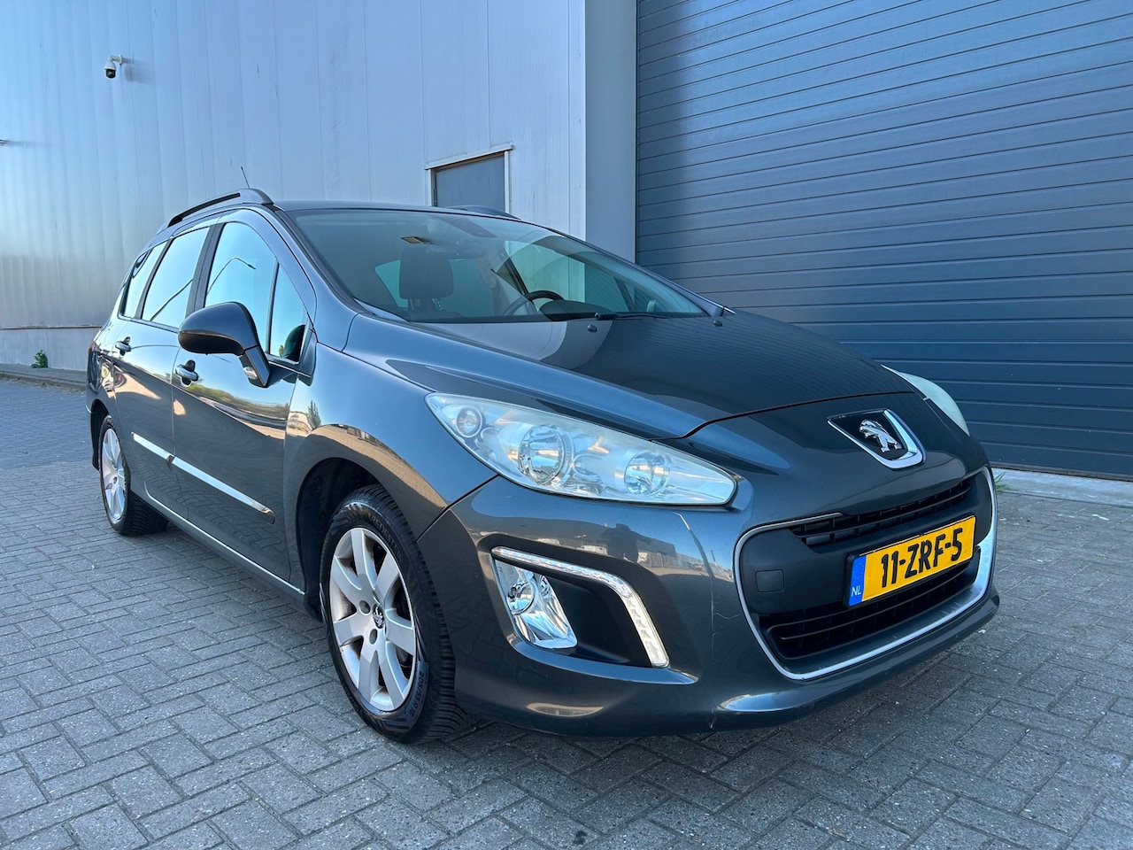 Peugeot 308 SW - 1.6 VTi X-Line AIRCO PDC LED 2012 - AutoWereld.nl
