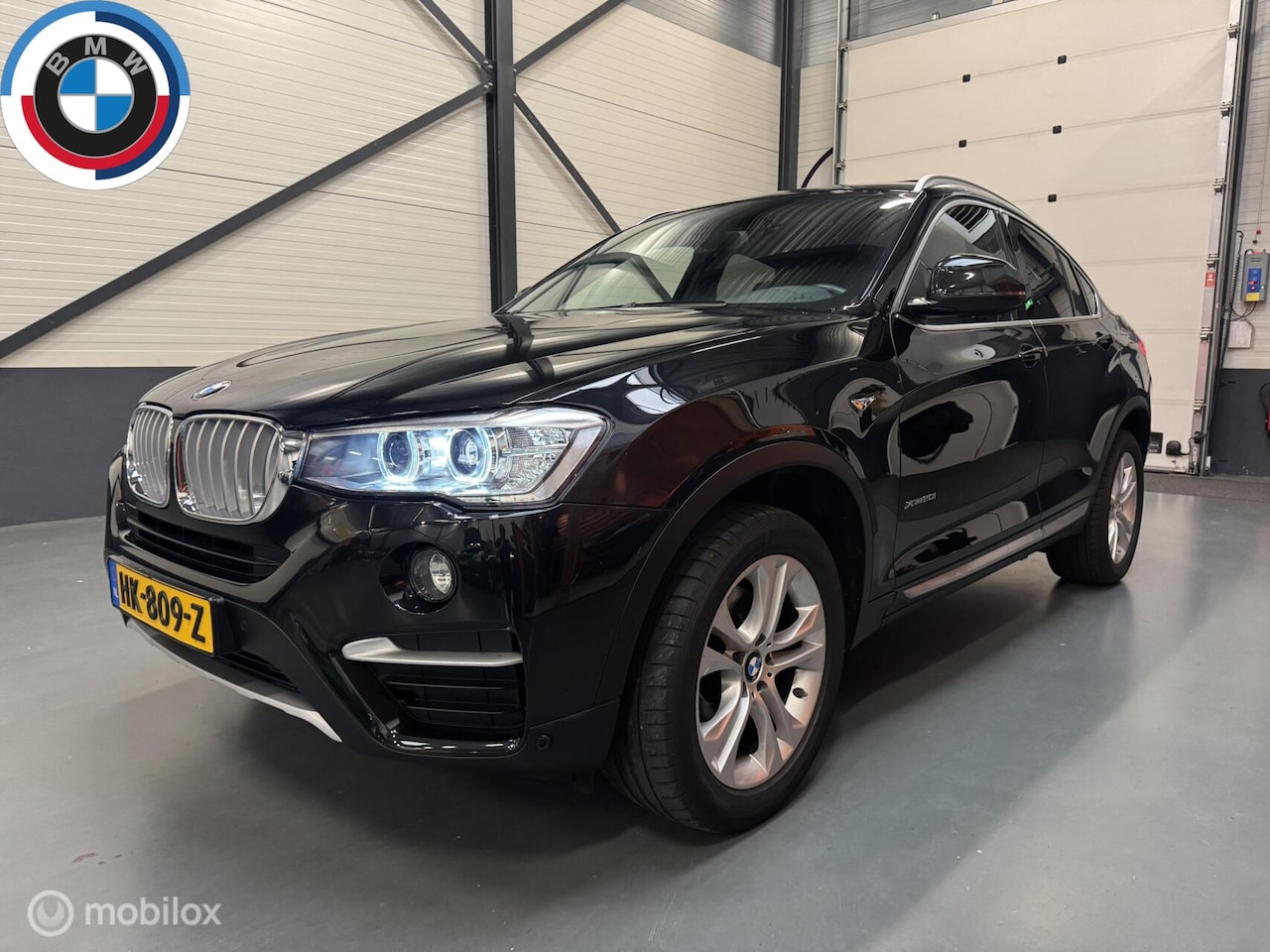 BMW X4 - xDrive20i High Executive Leer|Schuifdak|NL-Auto! - AutoWereld.nl