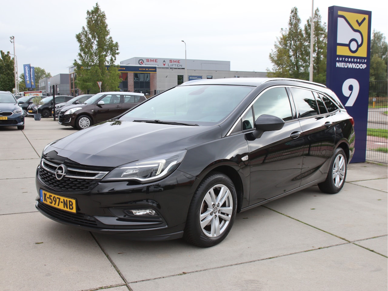 Opel Astra Sports Tourer - 1.4 Business Executive Stuur-Stoel verwarming, trekhaak, Carplay Aanbieding! - AutoWereld.nl