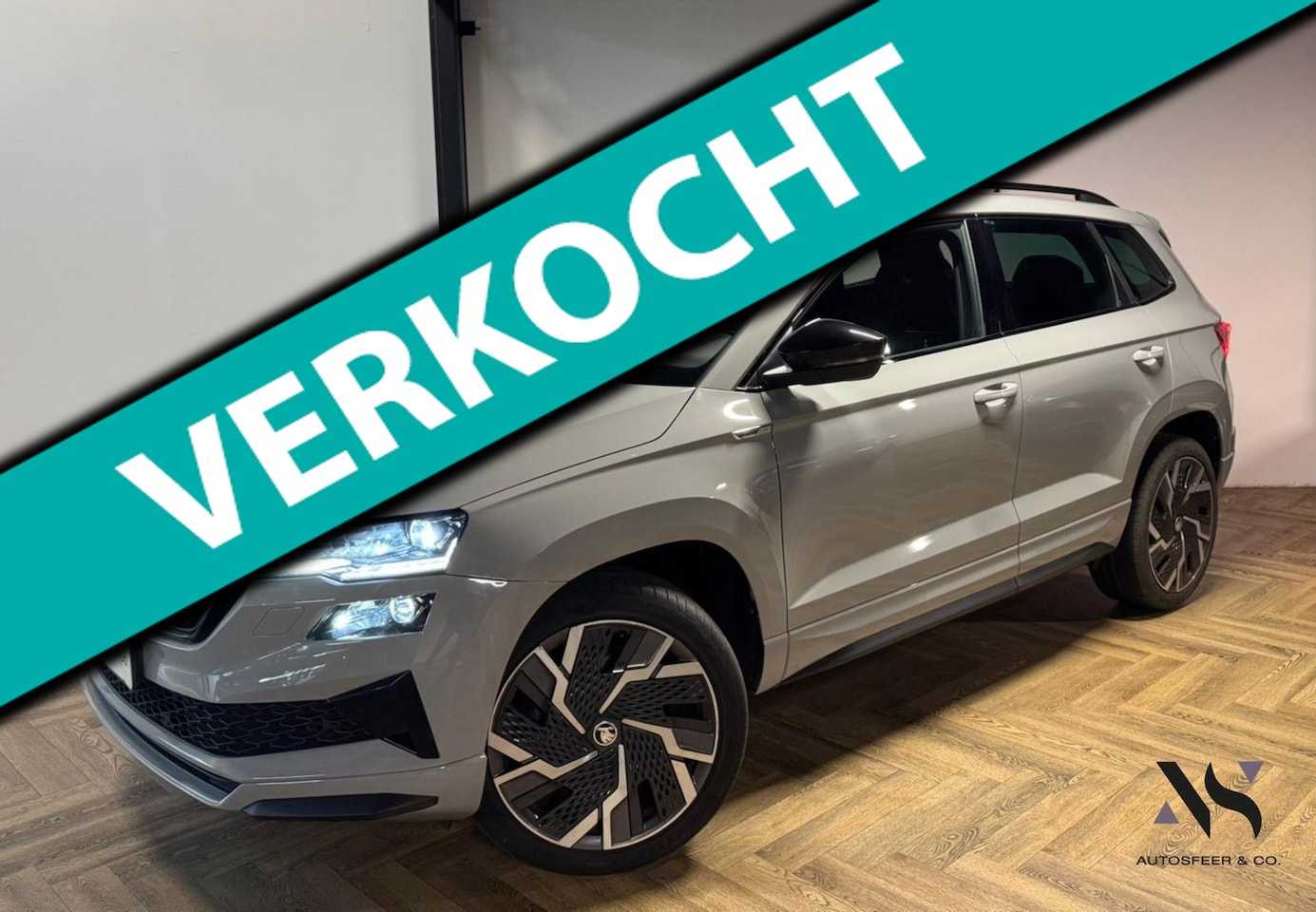 Skoda Karoq - 1.5 TSI ACT Sportline Business KEYLESS CAM SFEER - AutoWereld.nl