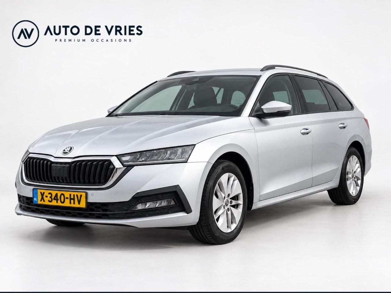 Skoda Octavia Combi - 1.0 e-TSI 110pk DSG Business Edition | Navigatie | Stoelverwarming | Trekhaak - AutoWereld.nl