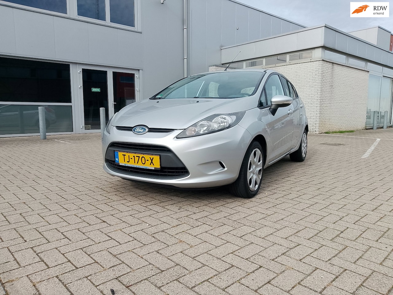 Ford Fiesta - 1.25 Ghia 1.25 Ghia - AutoWereld.nl