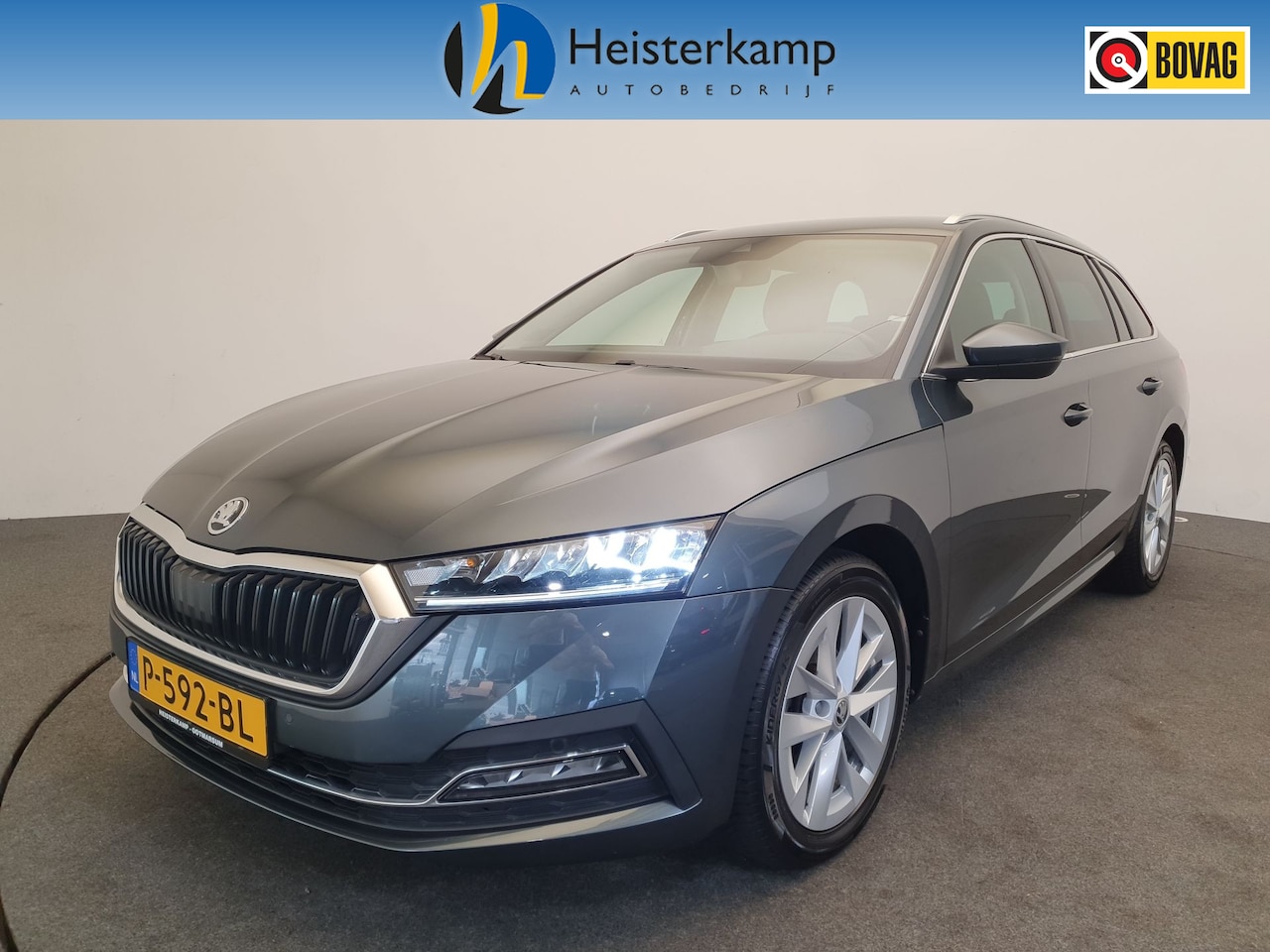 Skoda Octavia Combi - 1.0 e-TSI Business Edition Trekhaak, Stoelverwarming, Camera - AutoWereld.nl