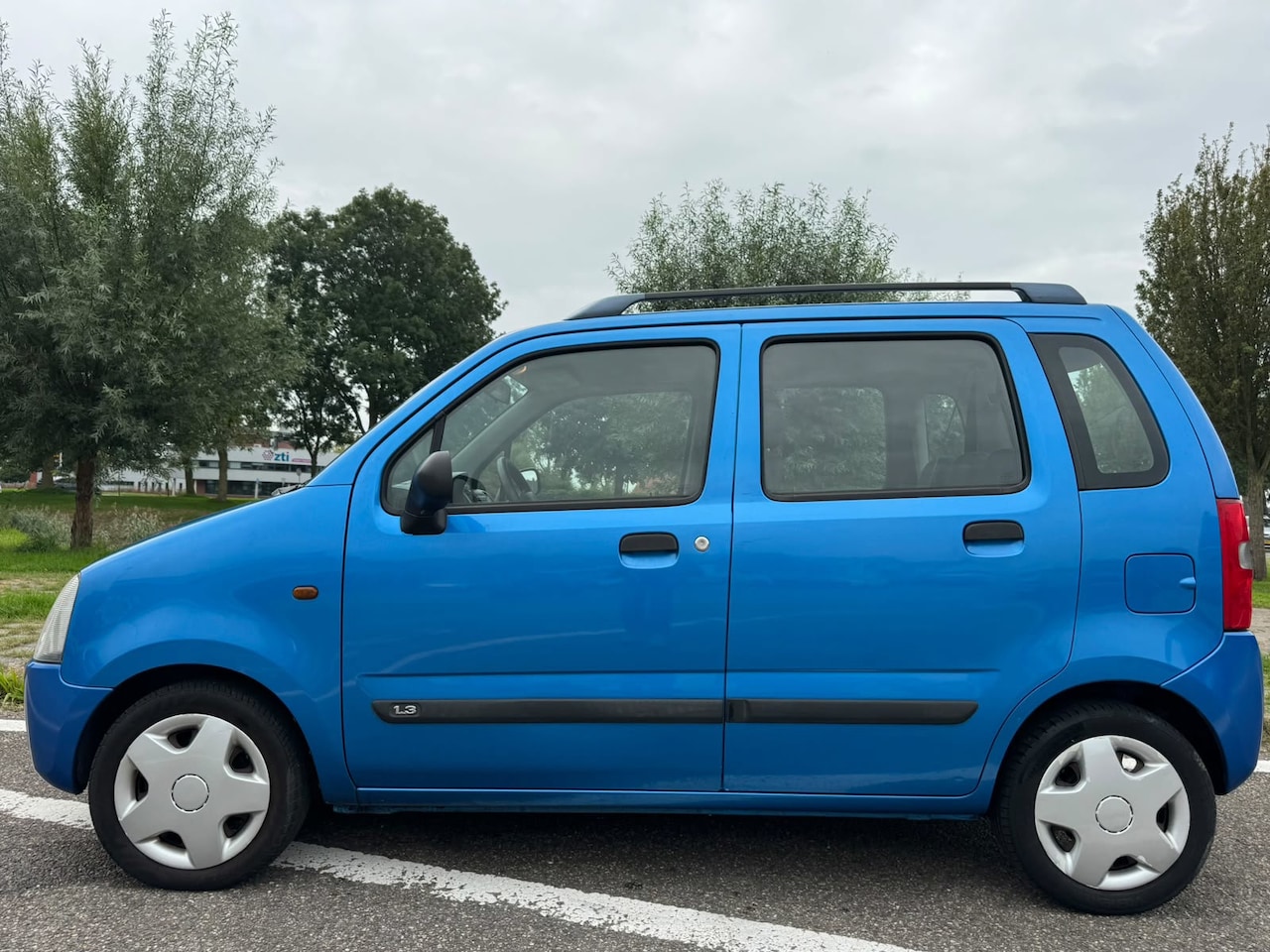 Suzuki Wagon R+ - 1.3 GLS Stuurbekrachtiging Electric pakket Getint glas EBD Dakrails Dealeronderhoud APK 06 - AutoWereld.nl