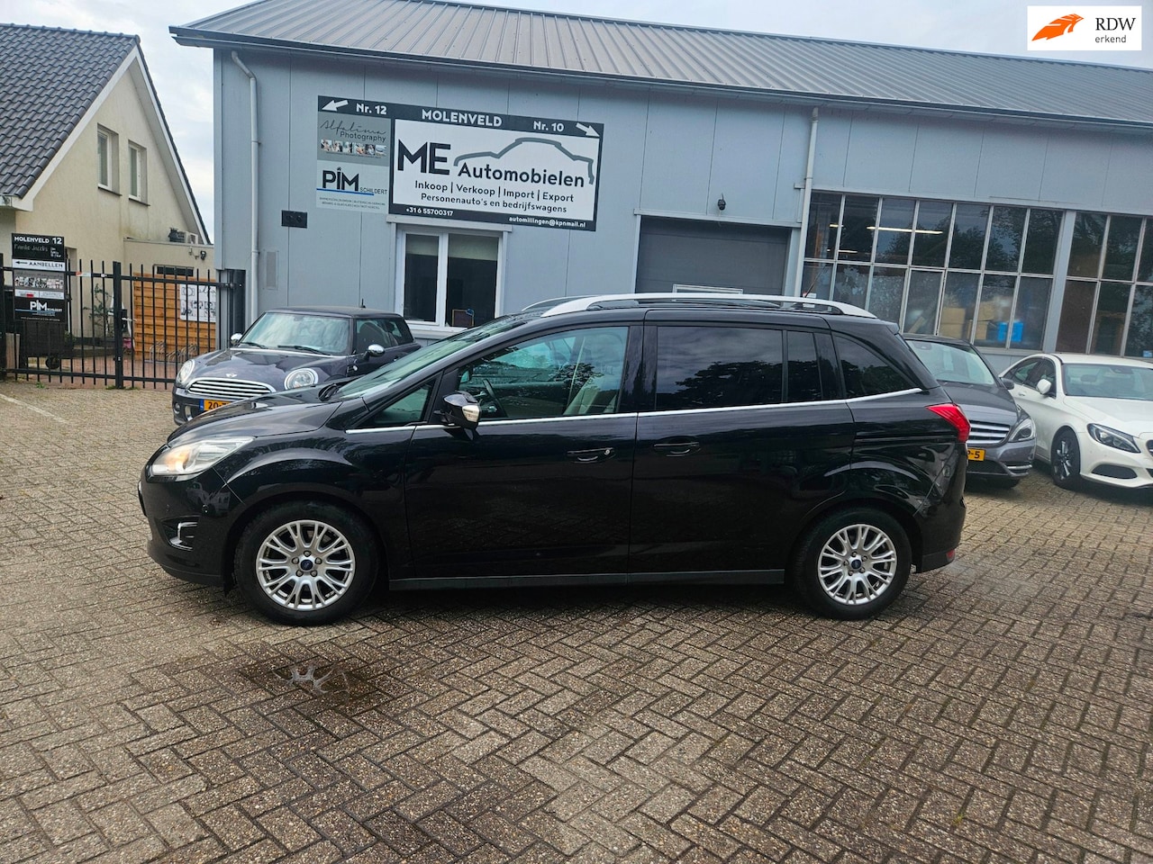 Ford Grand C-Max - 1.0 Titanium Pano/Leder/ Park Assist LEZEN! - AutoWereld.nl