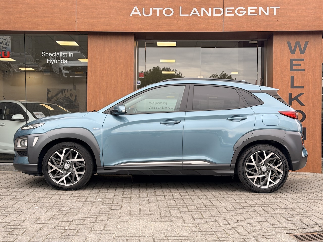 Hyundai Kona - 1.6 GDI HEV Premium | Carplay | Camera | DAB | Cruise control | Trekhaak - AutoWereld.nl