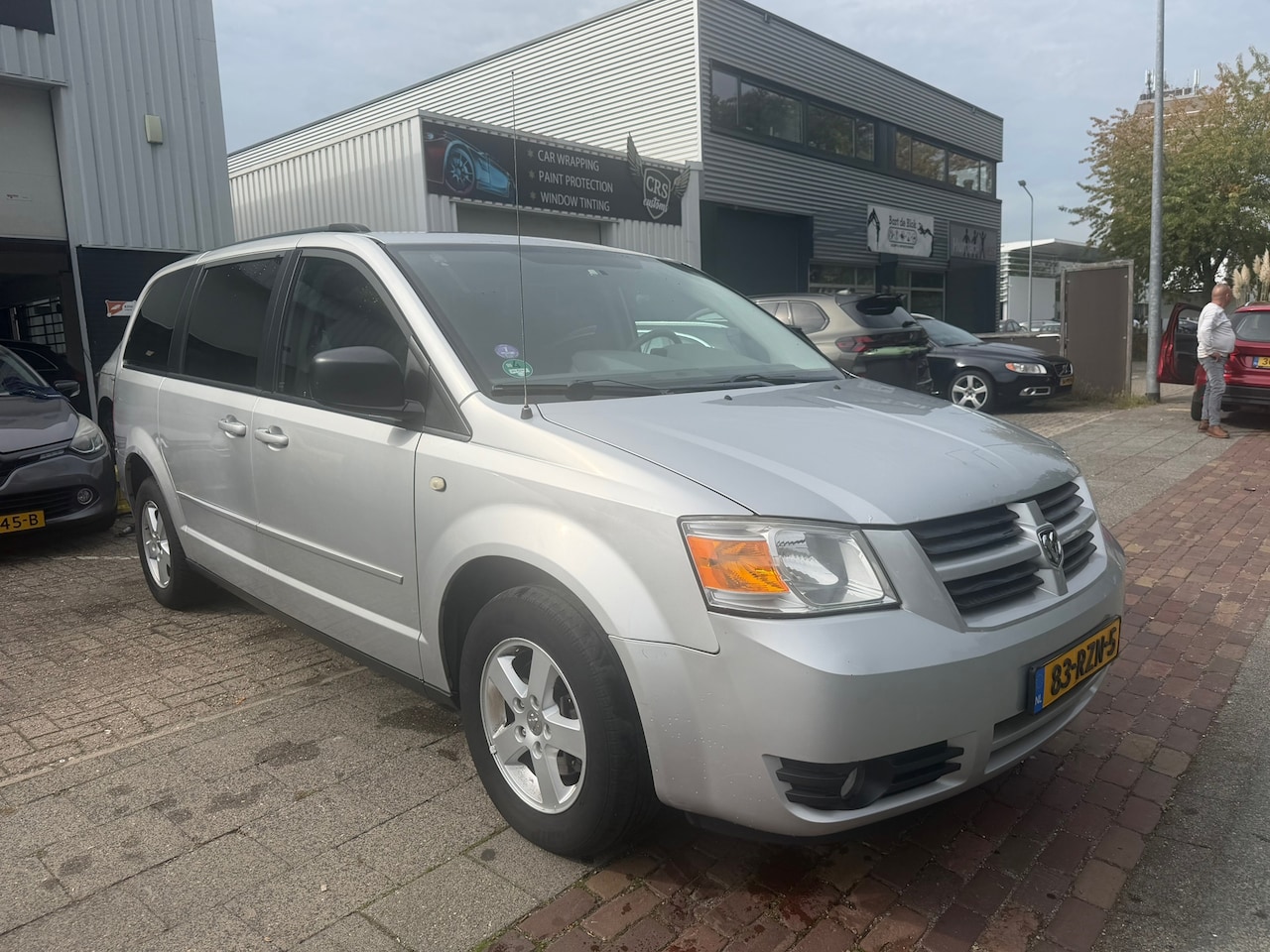 Dodge Grand Caravan - 3.8 7 PERSOONS - AutoWereld.nl
