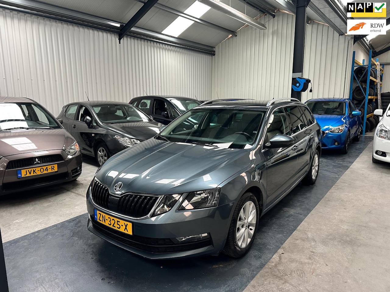 Skoda Octavia Combi - 1.6 TDI Greentech Clever Edition 1.6 TDI Greentech Clever Edition - AutoWereld.nl