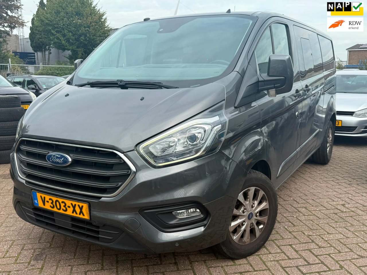 Ford Transit Custom - 340 2.0 TDCI L2H1 DC | Tik in motor - AutoWereld.nl