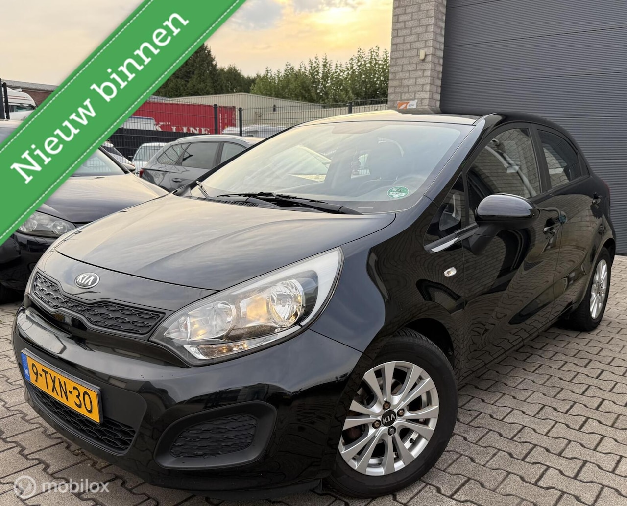 Kia Rio - 1.2 CVVT ComfortLine / BJ 2014 / Airco / N.A.P - AutoWereld.nl