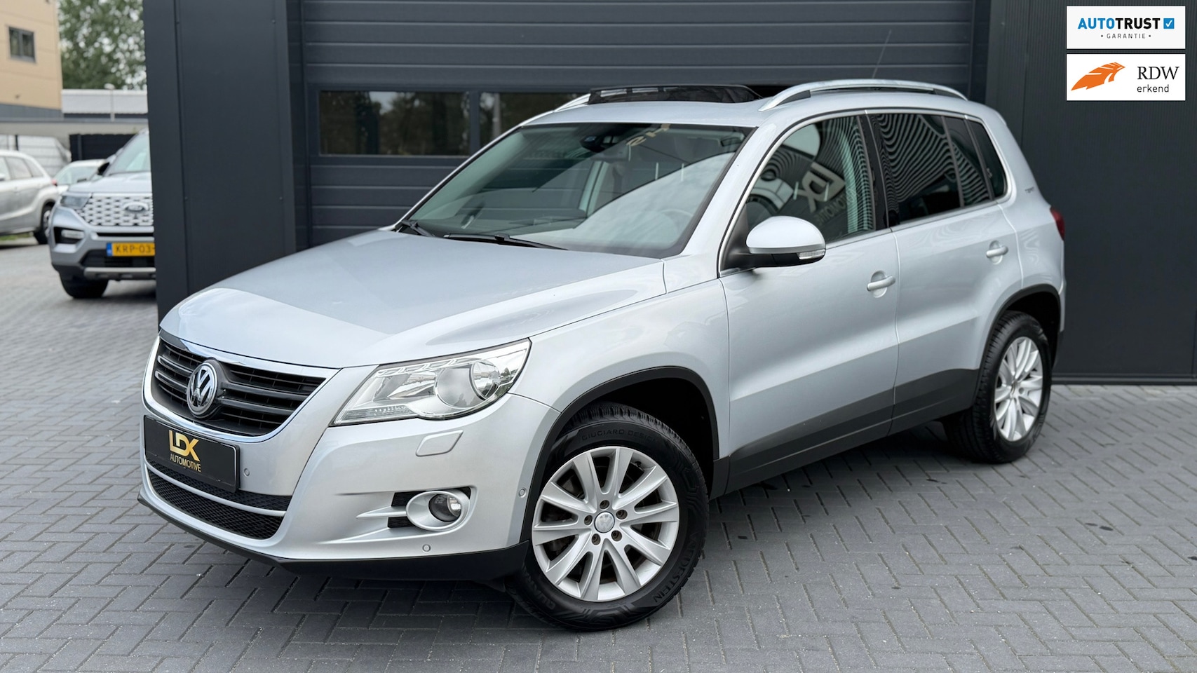 Volkswagen Tiguan - 1.4 TSI Sport&Style Pano|Caprlay|Cruise - AutoWereld.nl