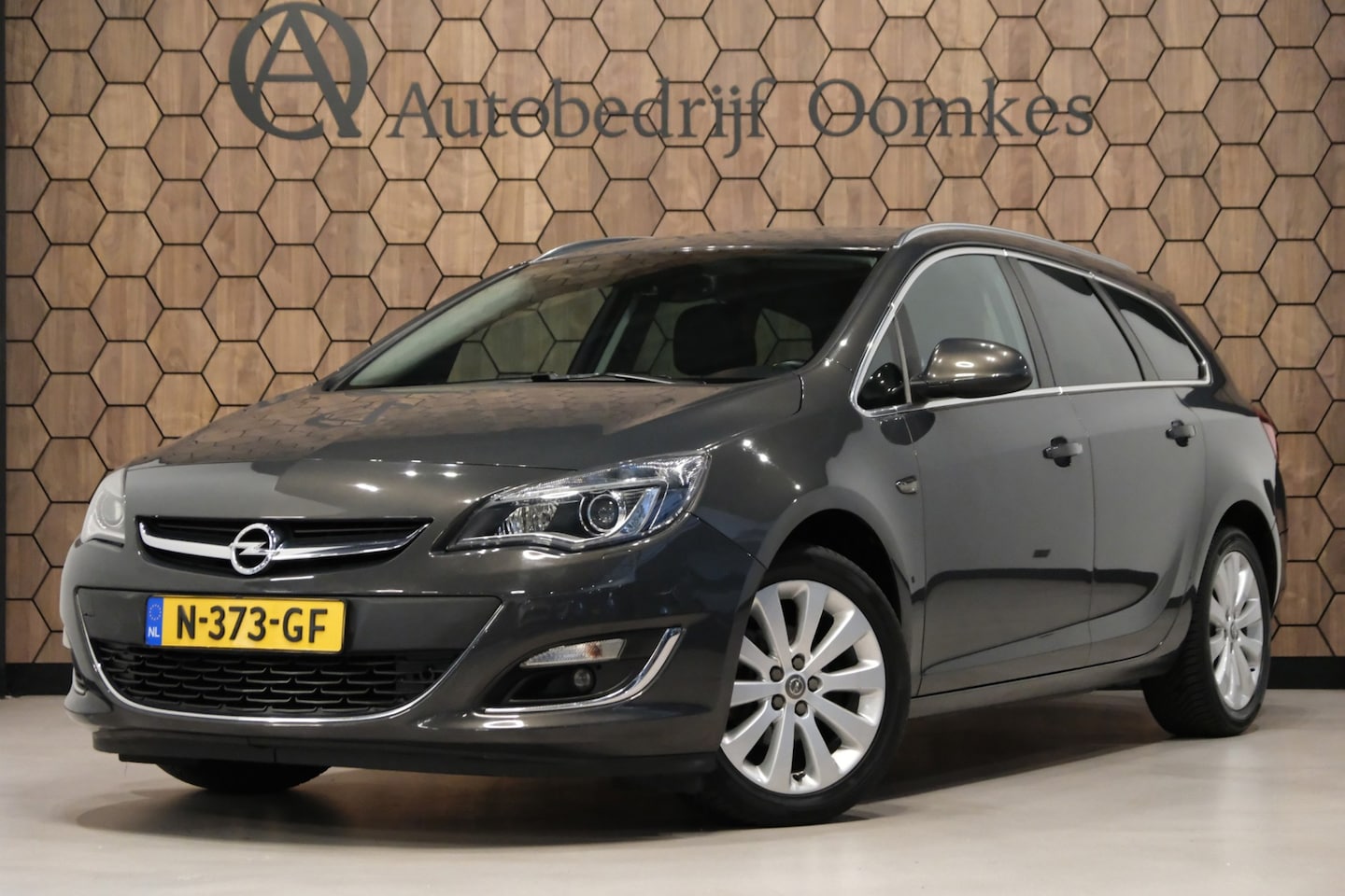 Opel Astra Sports Tourer - 1.6 Turbo *Sportleder* Navi/Trekhaak |AUTOMAAT| 132dkm!! APK 10-2027 - AutoWereld.nl