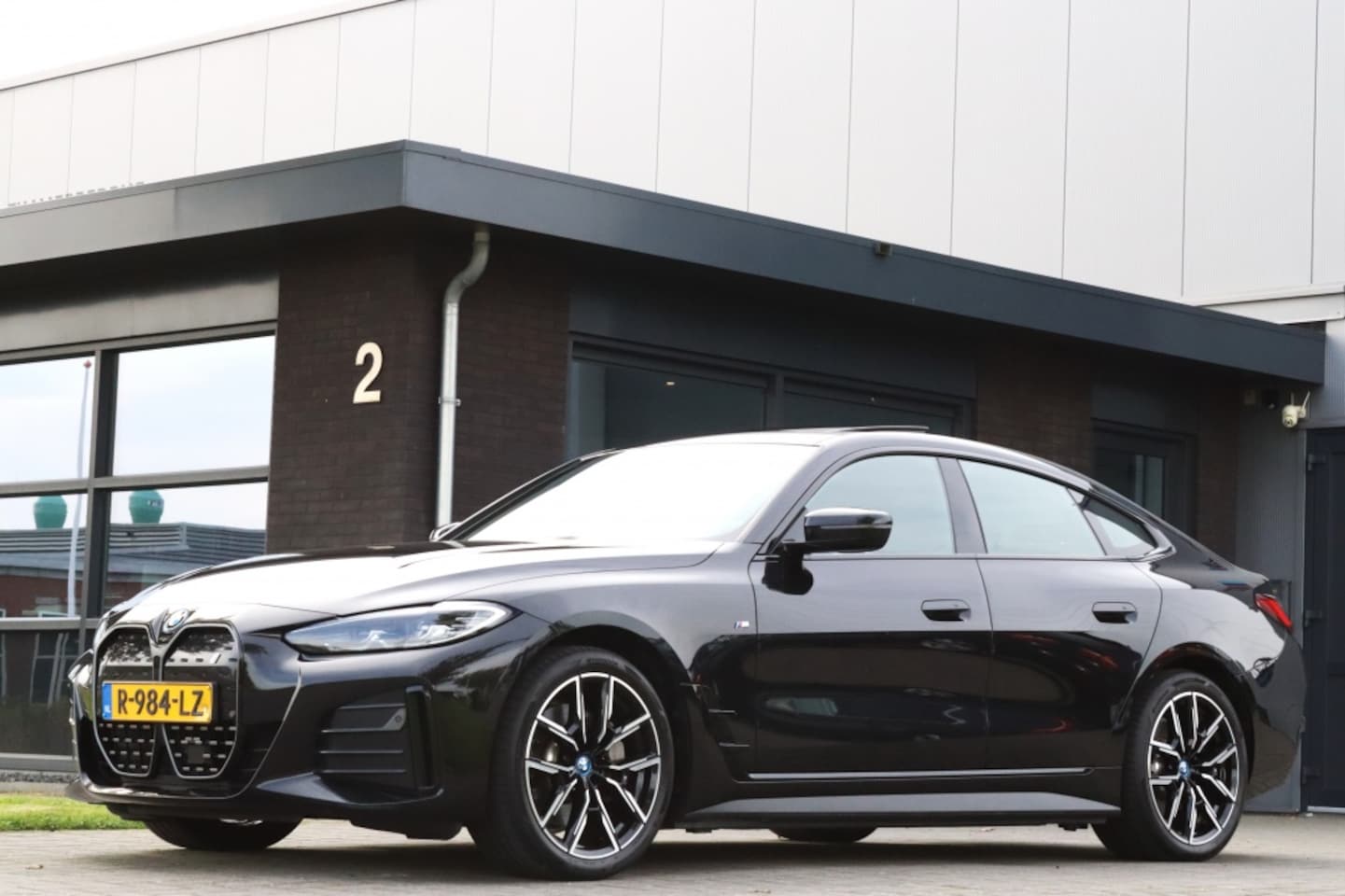 BMW i4 - eDrive40 M Sport I Trekhaak I Open dak I ACC I 19 inch - AutoWereld.nl