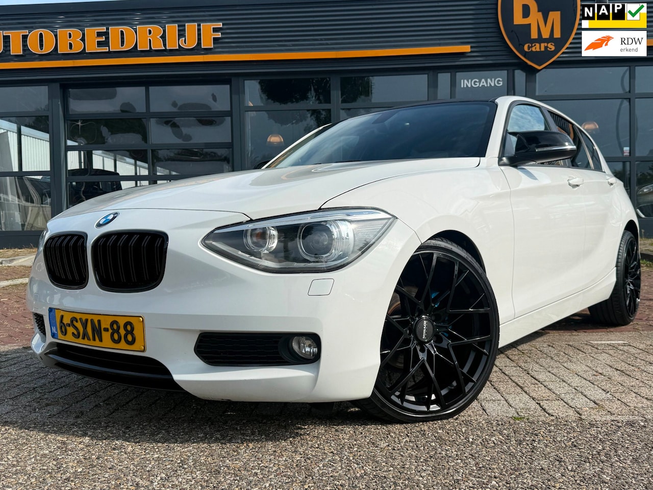BMW 1-serie - 114i HIgh Executive | Airco | PDC | Cruise | Sport-Line | - AutoWereld.nl