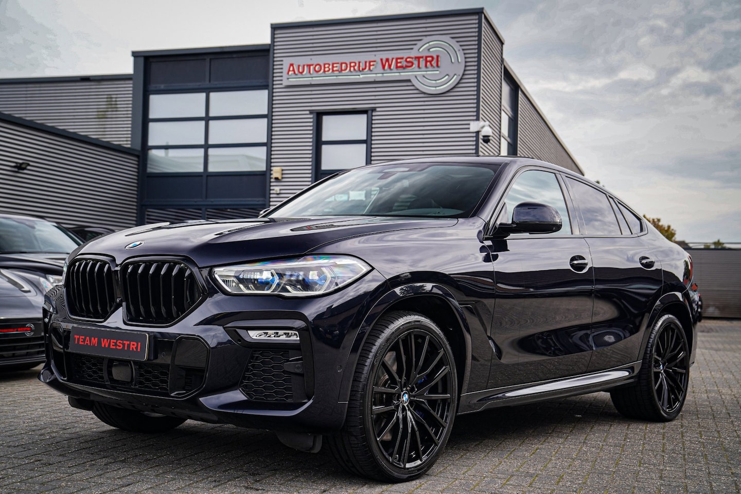BMW X6 - XDrive40i High Executive | Panorama | 360cam | Carbon | Adaptieve cruise control | Kristal - AutoWereld.nl