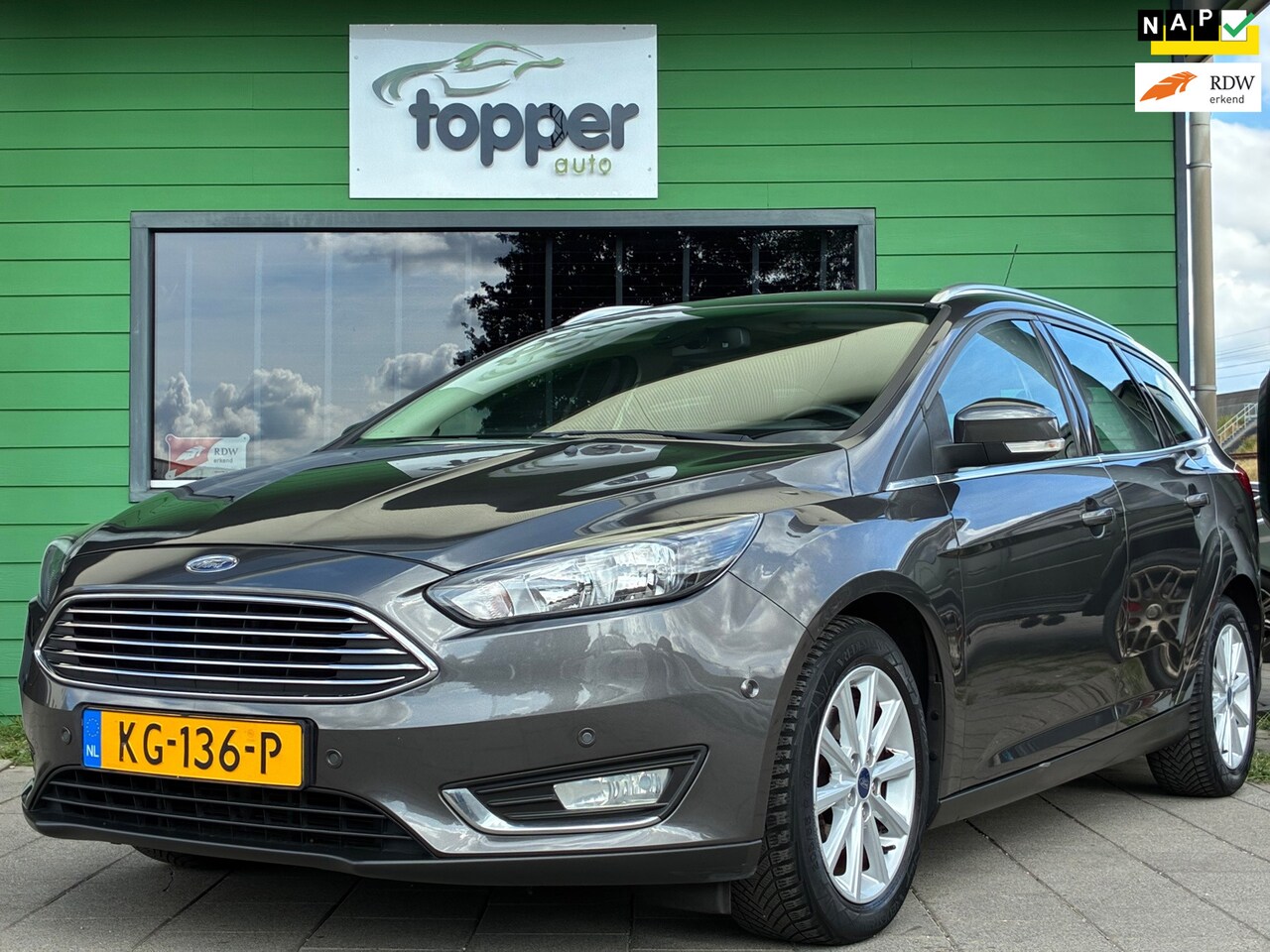 Ford Focus Wagon - 1.0 Titanium|2e Eigenaar|Navigatie|CruiseControl|Climatronic|PDC|Dealer Onderhouden| - AutoWereld.nl