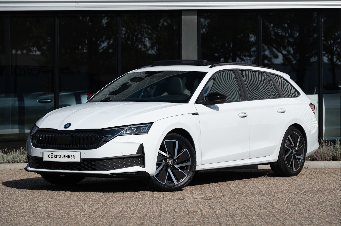 Skoda Octavia Combi - 1.5 TSI MHEV Sportline Business | Pano | Trekhaak | ACC | Navi | Dodehoekdet. | Matrix LED - AutoWereld.nl