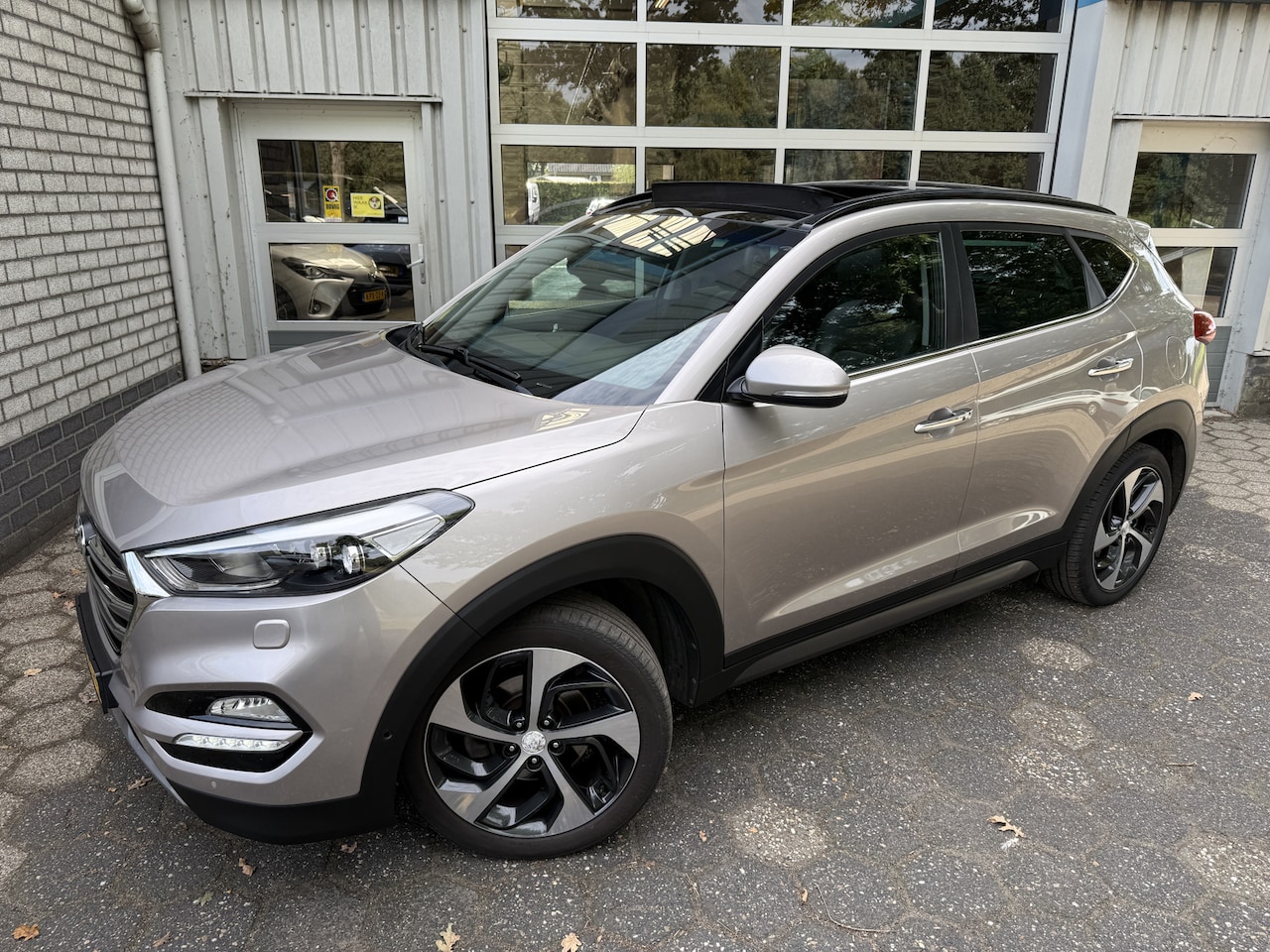 Hyundai Tucson - 1.6 T-GDi Premium 4WD / Panoramadak / lederen bekleding - AutoWereld.nl