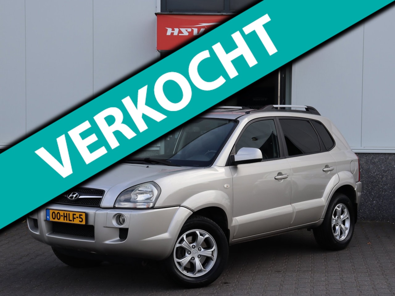 Hyundai Tucson - 2.7i V6 4WD Style airco LM org NL - AutoWereld.nl