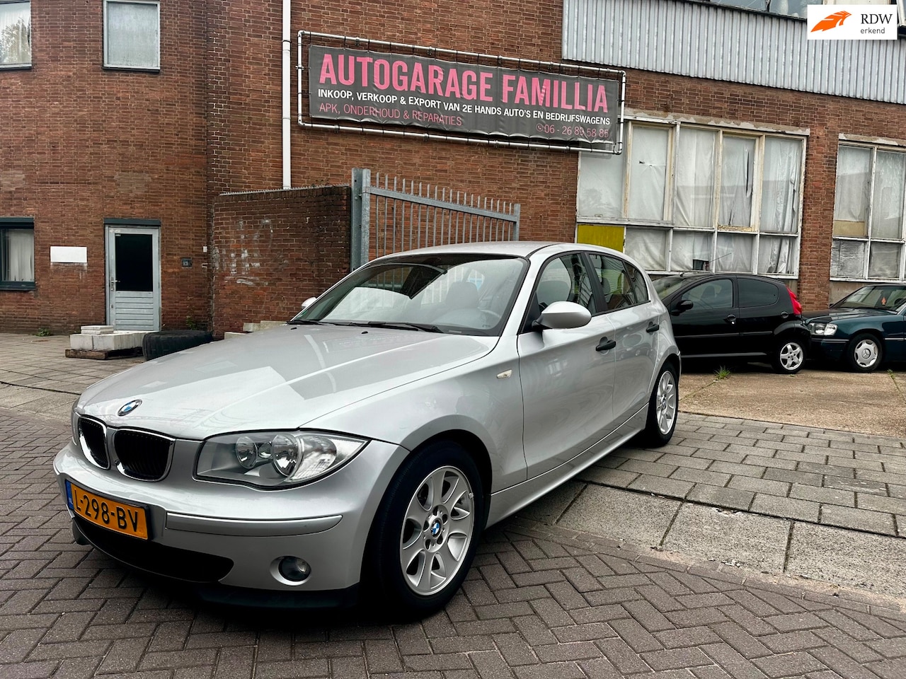 BMW 1-serie - 118i High Executive automaat - AutoWereld.nl