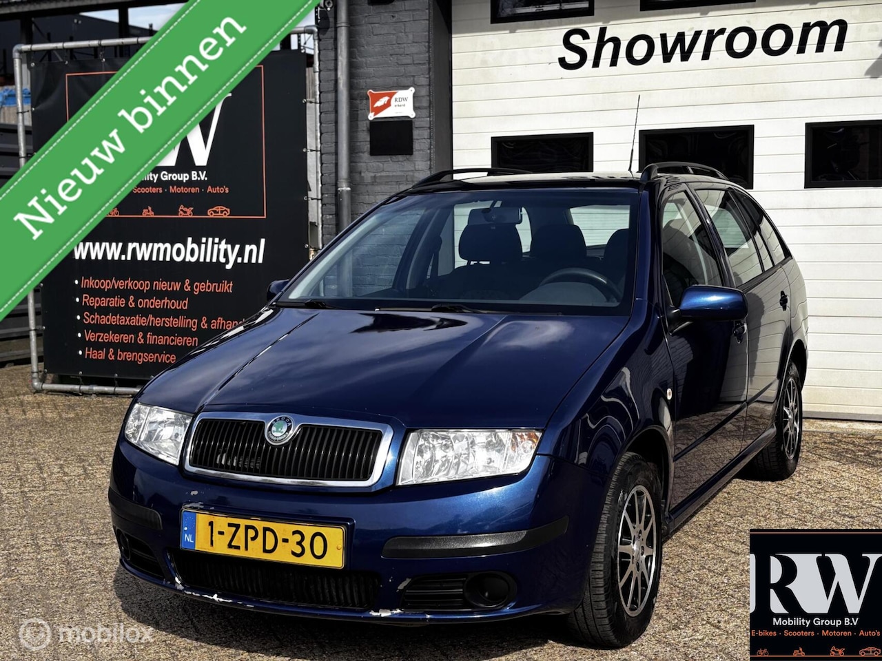 Skoda Fabia Combi - 1.4-16V Ambiente *AIRCO*APK TOT 06-2027* - AutoWereld.nl