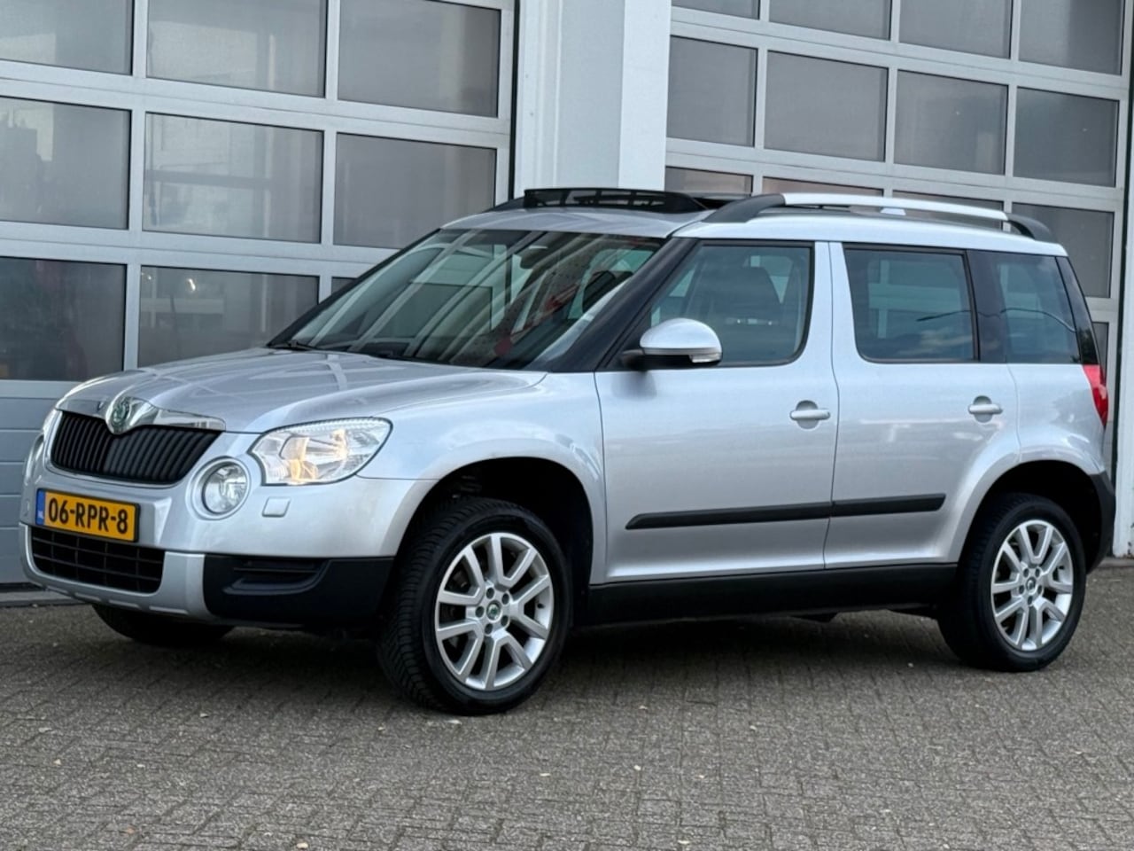 Skoda Yeti - 1.2 TSI 105PK Elegance Aut. Clima Cruise Pano Trekhaak - AutoWereld.nl