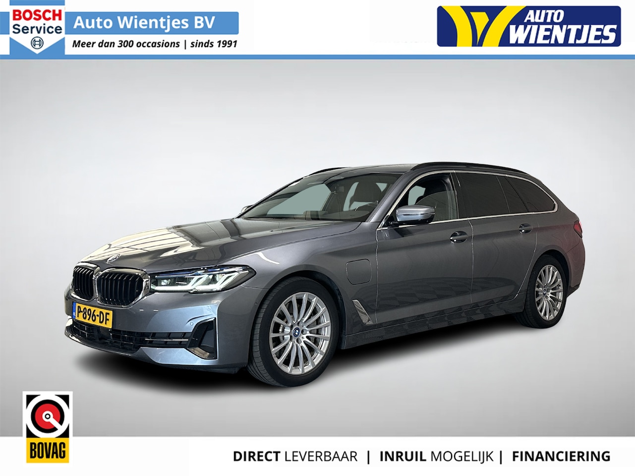 BMW 5-serie Touring - 520e | Business Edition Plus | Leer | Navi | Camera - AutoWereld.nl