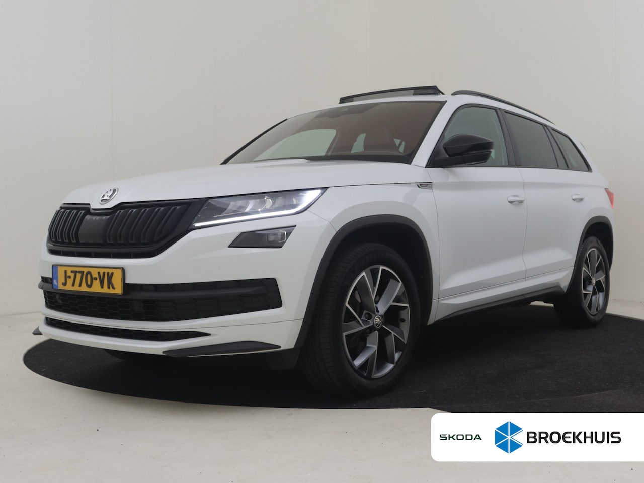 Skoda Kodiaq - 1.5 TSI Sportline Business 7p. l Elektr. Trekhaak l Pano Dak l Elekt. Stoel incl Memory l - AutoWereld.nl