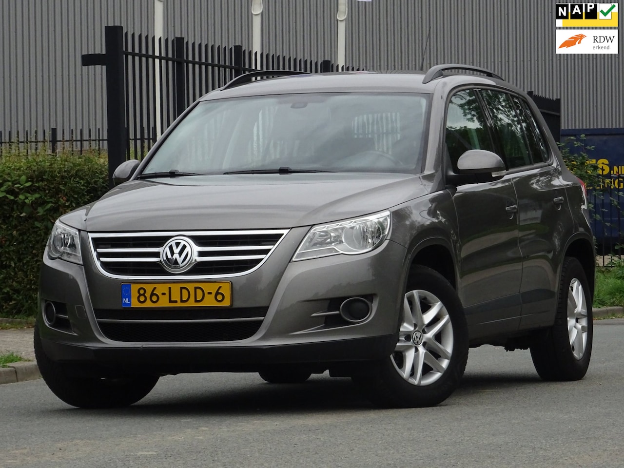 Volkswagen Tiguan - 1.4 TSI NAP/CARPLAY/NAVI/CAMERA/AC/CRUISE - AutoWereld.nl