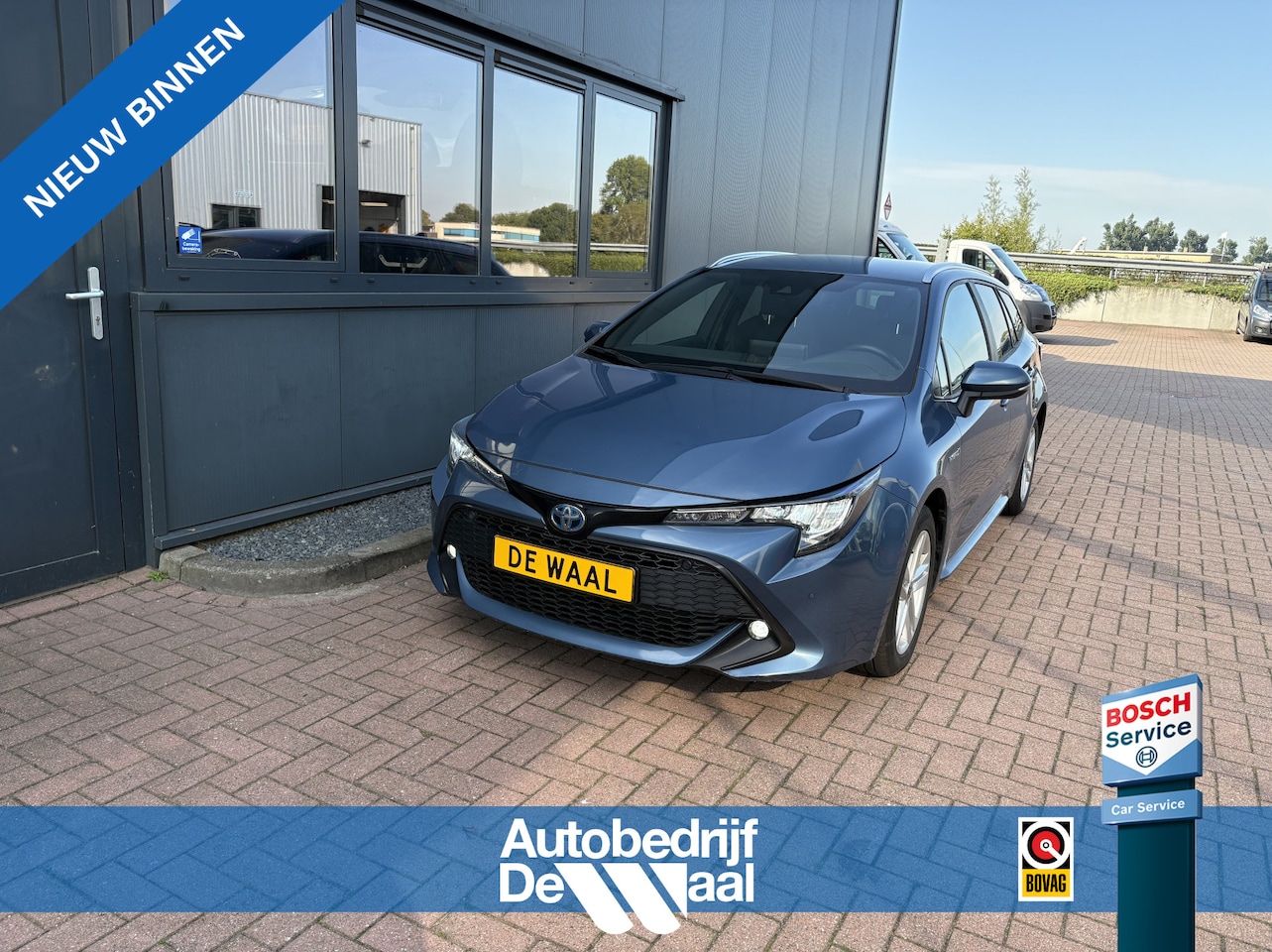 Toyota Corolla Touring Sports - 1.8 Hybrid Business Plus KEYLESS/CAMERA/ADAPT.CRUISE/PDC - AutoWereld.nl